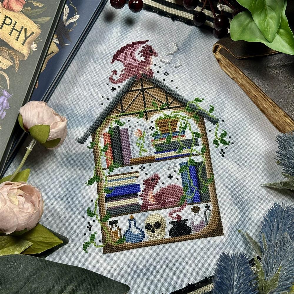 The Stitch Crypt House of Book Dragons Cross Stitch Pattern