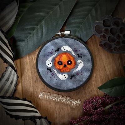 Cross stitch pattern of a skull design called All Hallows Skull by designer The Stitch Crypt