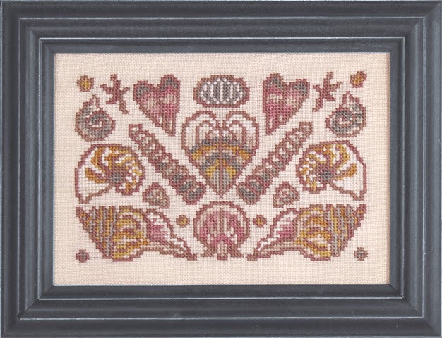 Ink Circles Arranging Seashells Cross Stitch Pattern