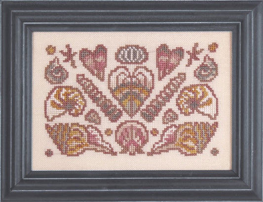 Ink Circles Arranging Seashells Cross Stitch Pattern